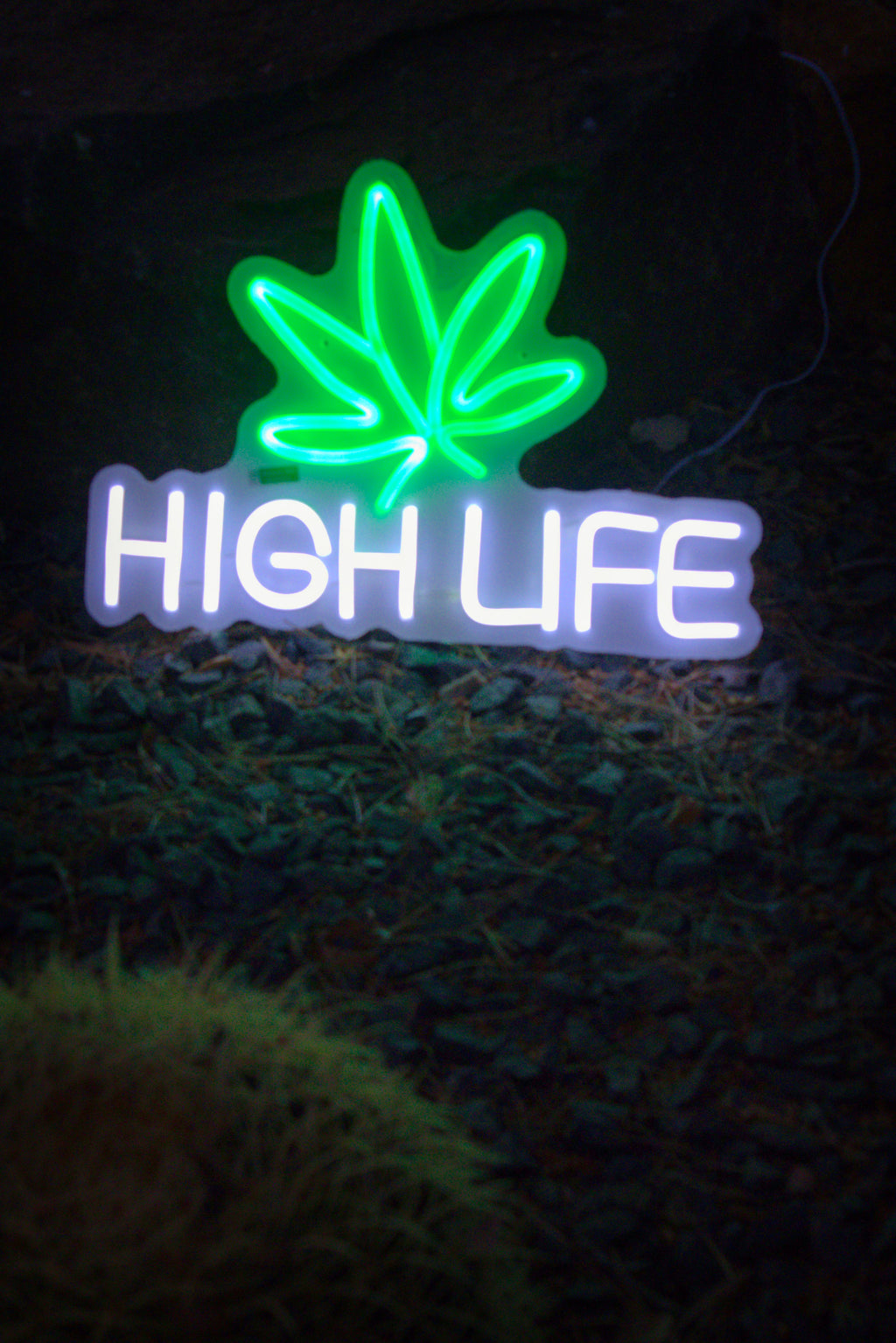 Vibrant Neon Leaf Sign